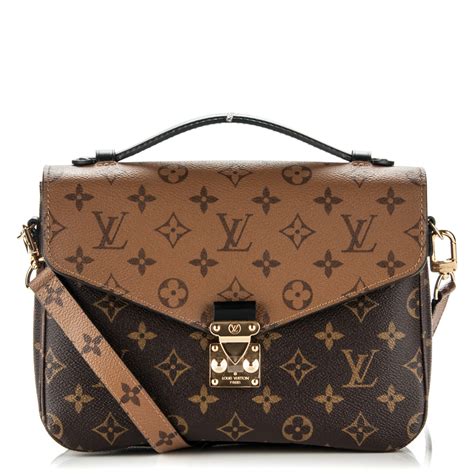 LOUIS VUITTON Reverse Monogram Pochette Metis.